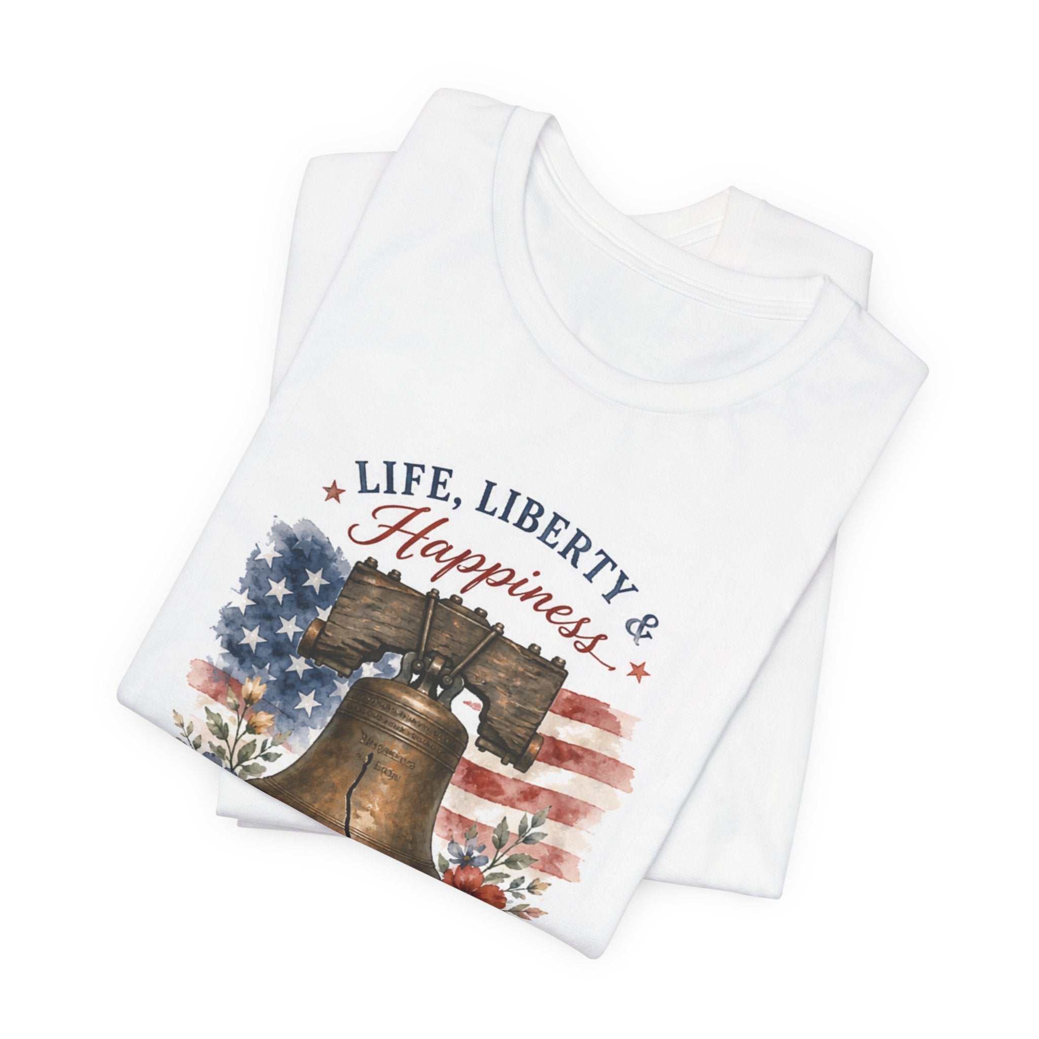 White t-shirt with Liberty Bell graphic and text "LIFE, LIBERTY & HAPPINESS".