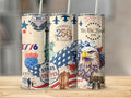 Patriotic tumbler designs featuring the Statue of Liberty, eagle, and American flag elements.